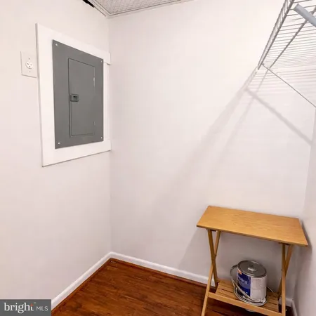 a view of small space with wooden floor