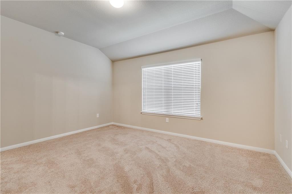 185 Voss Kyle, TX 78640 - Photo 17 of 26 an empty room with a window