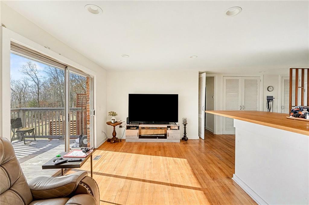 6900 Scenic Heights Road Manchester, GA 31816 - Photo 14 of 30 a living room with furniture and a flat screen tv