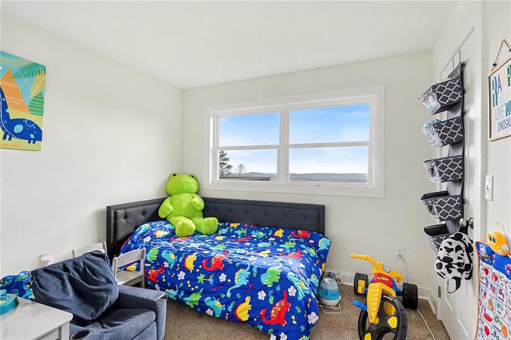 6900 Scenic Heights Road Manchester, GA 31816 - Photo 20 of 30 a bedroom with a bed and a window