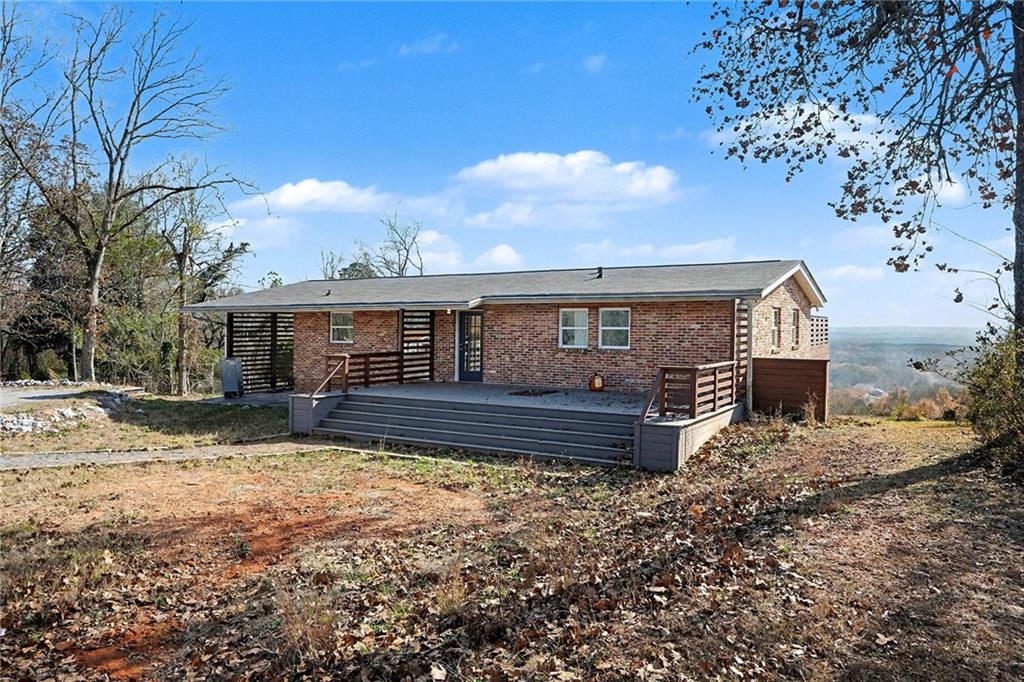 6900 Scenic Heights Road Manchester, GA 31816 - Photo 2 of 30 a house view with a garden space
