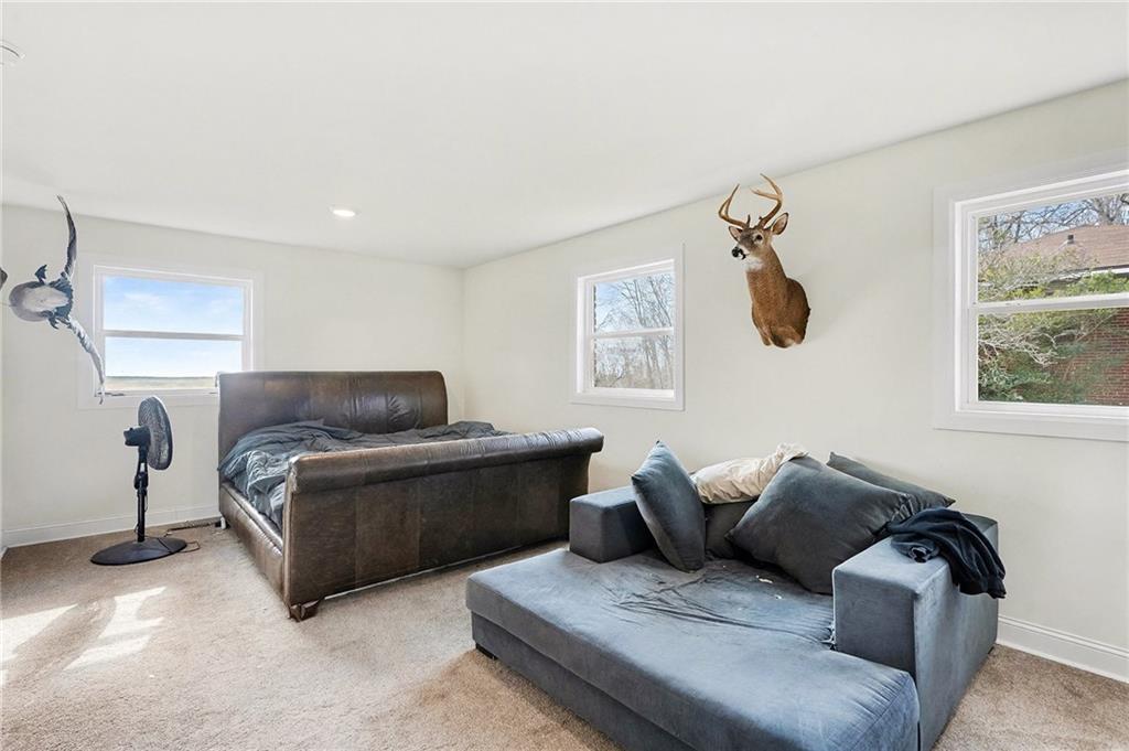 6900 Scenic Heights Road Manchester, GA 31816 - Photo 21 of 30 a living room with furniture and a window