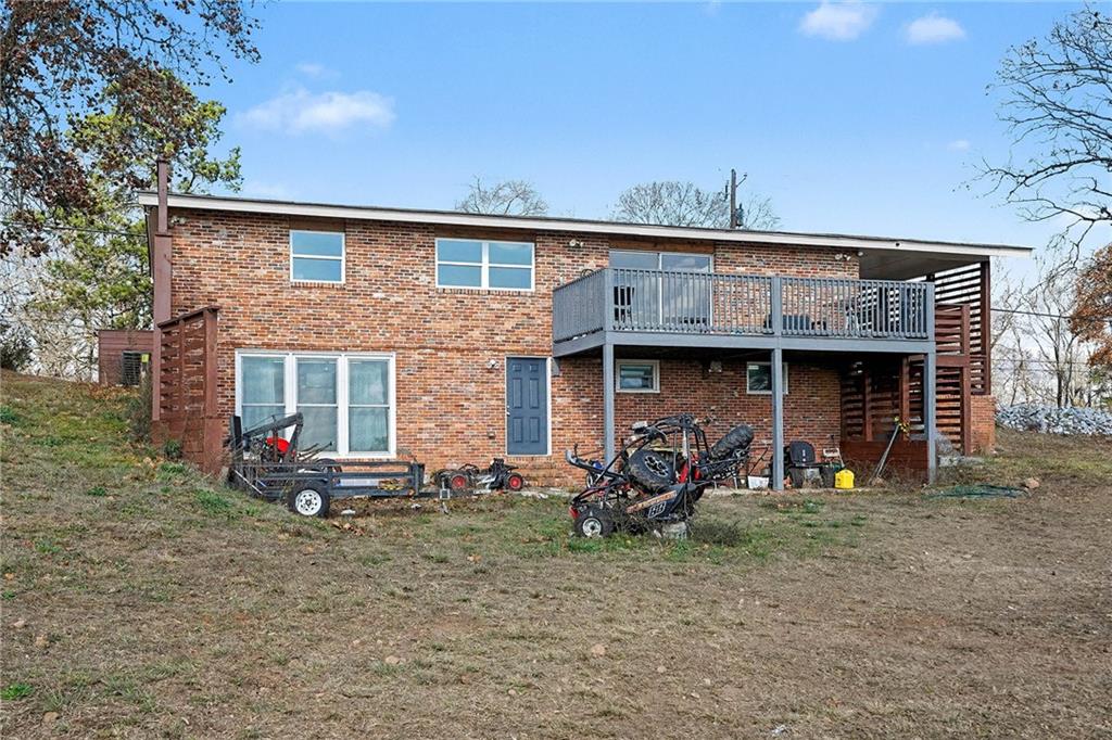 6900 Scenic Heights Road Manchester, GA 31816 - Photo 28 of 30 a front view of a house with many windows