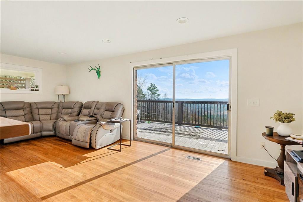 6900 Scenic Heights Road Manchester, GA 31816 - Photo 4 of 30 a living room with furniture and a gate