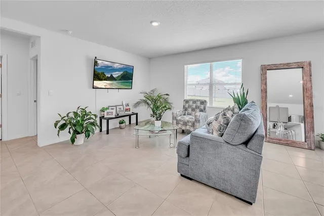 a kitchen with stainless steel appliances a refrigerator sink and cabinets