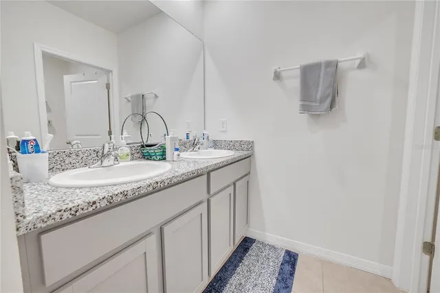 a view of a swimming pool with an outdoor space and seating area