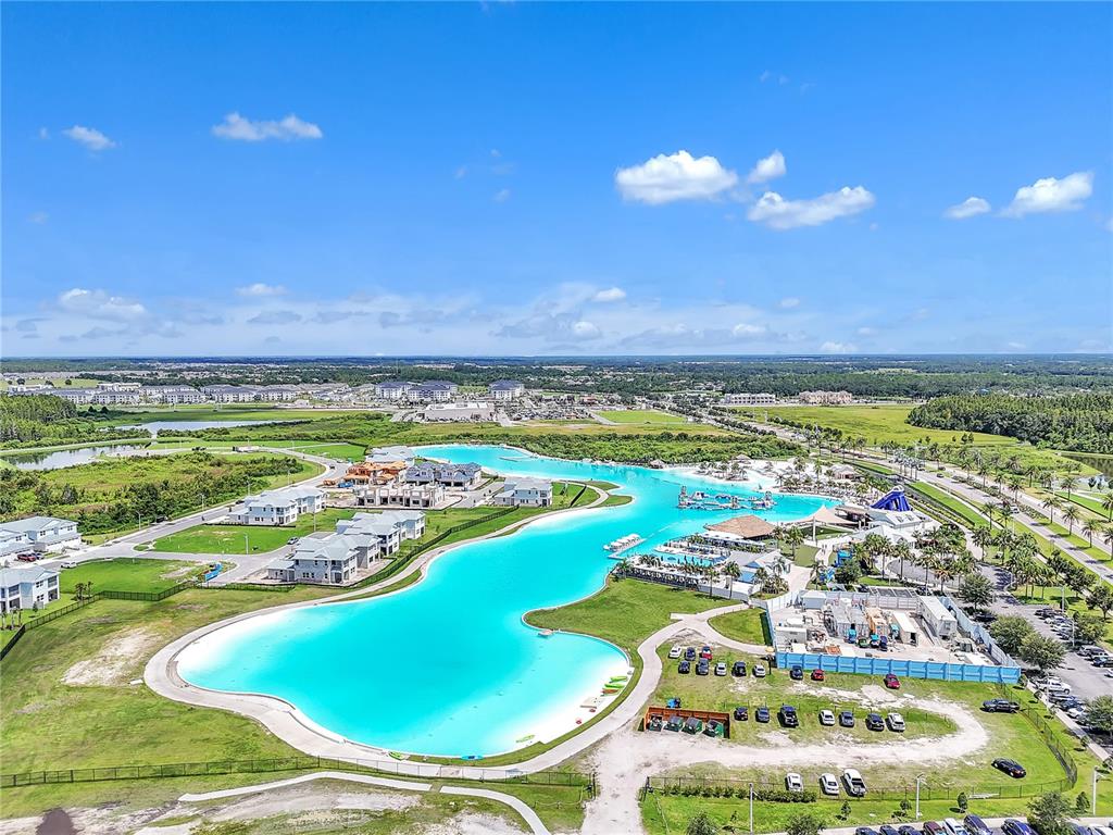 8237 Juning Cove Wesley Chapel, FL 33545 - Photo 58 of 59 a view of a swimming pool with an outdoor space and seating area