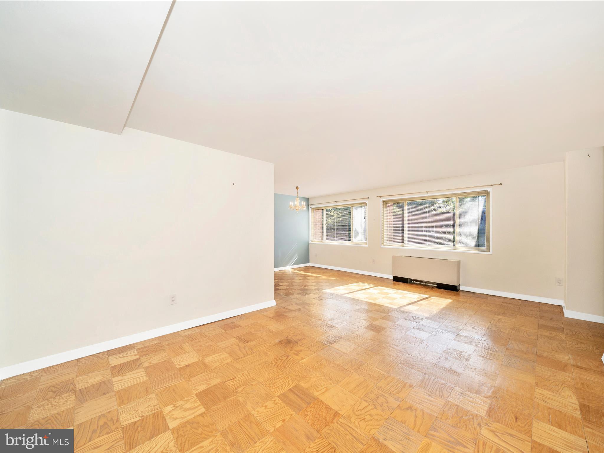 3900 Tunlaw Road Northwest, Unit 613 Washington, DC 20007 - Photo 11 of 31 a view of an empty room with a window