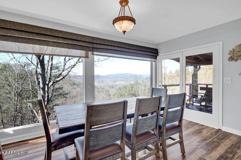 3514 Jakes Ridge Sevierville, TN 37862 - Photo 9 of 28 a view of a dining room with furniture window and outside view