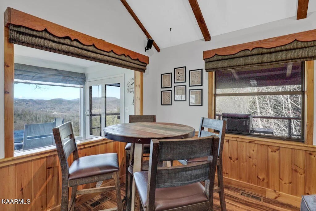 3514 Jakes Ridge Sevierville, TN 37862 - Photo 10 of 28 a view of a dining room with furniture window and wooden floor