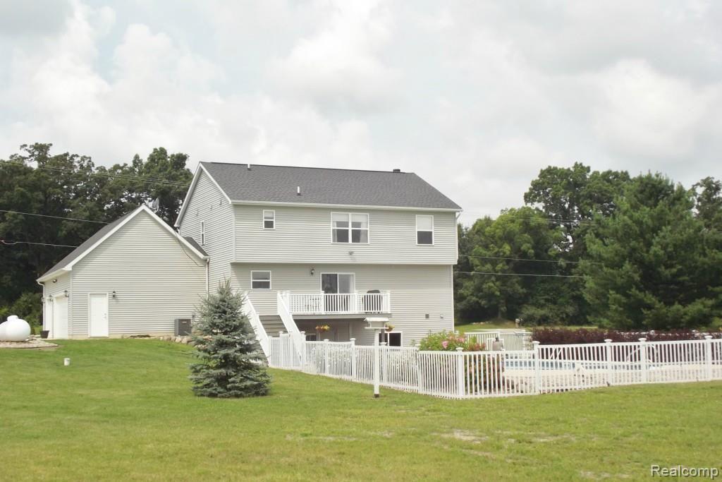 1937 Dutcher Road Howell, MI 48843 - Photo 2 of 18 1937 Dutcher back 2.jpg