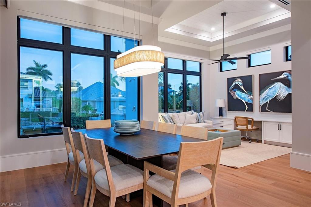1456 Curlew Avenue Naples, FL 34102 - Photo 13 of 38 a view of a dining room with furniture window and outside view