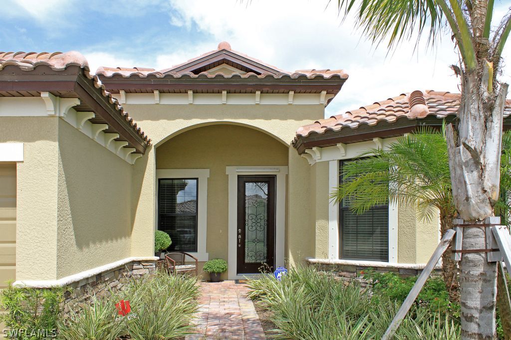 10874 Rutherford Road Fort Myers, FL 33913 - Photo 24 of 24 front view of a house with a porch
