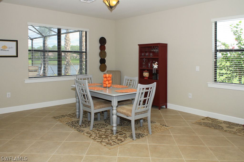 10874 Rutherford Road Fort Myers, FL 33913 - Photo 10 of 24 a dining room with furniture and window