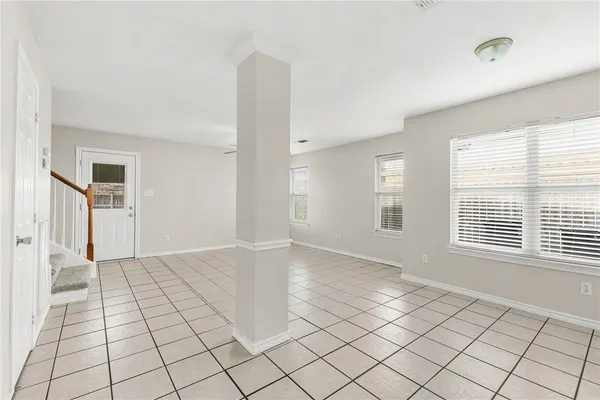 a view of an empty room and window