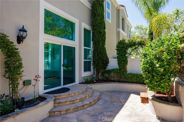 a view of a potted plants in front of a house