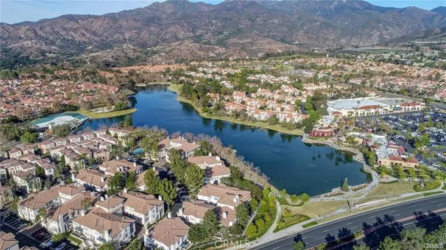 an aerial view of residential house with outdoor space and swimming pool