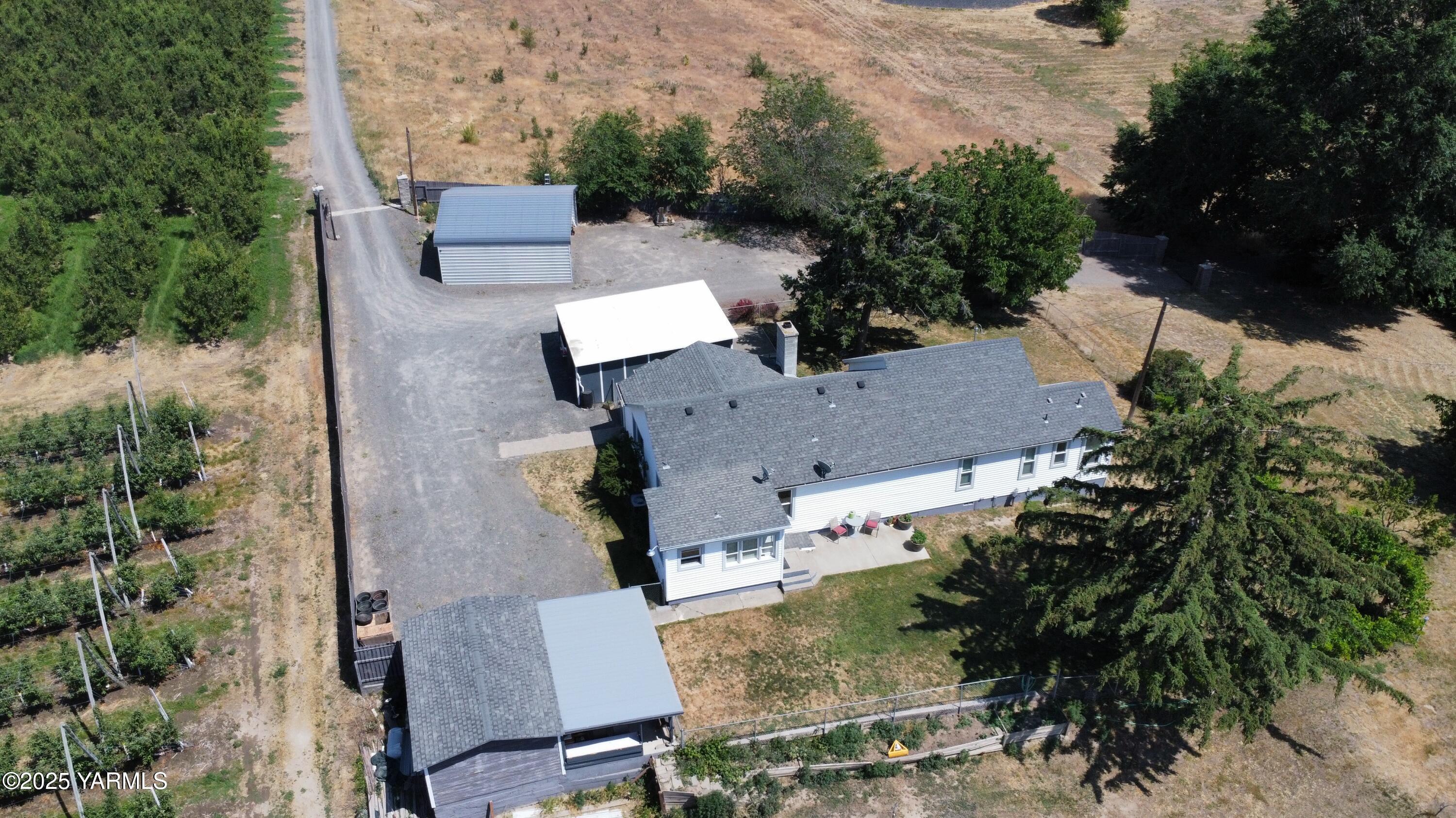 960 Knight Hill Road Zillah, WA 98953 - Photo 3 of 21 an aerial view of house with yard