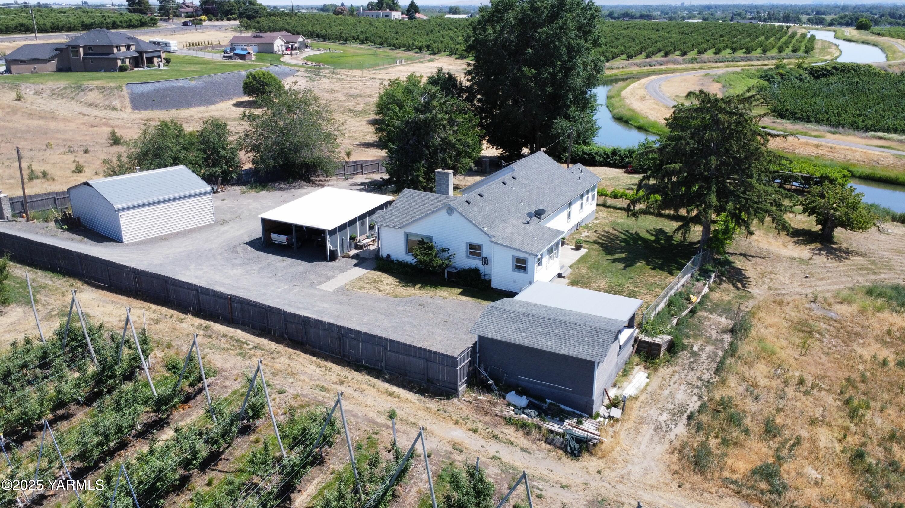 960 Knight Hill Road Zillah, WA 98953 - Photo 6 of 21 an aerial view of a house with outdoor space