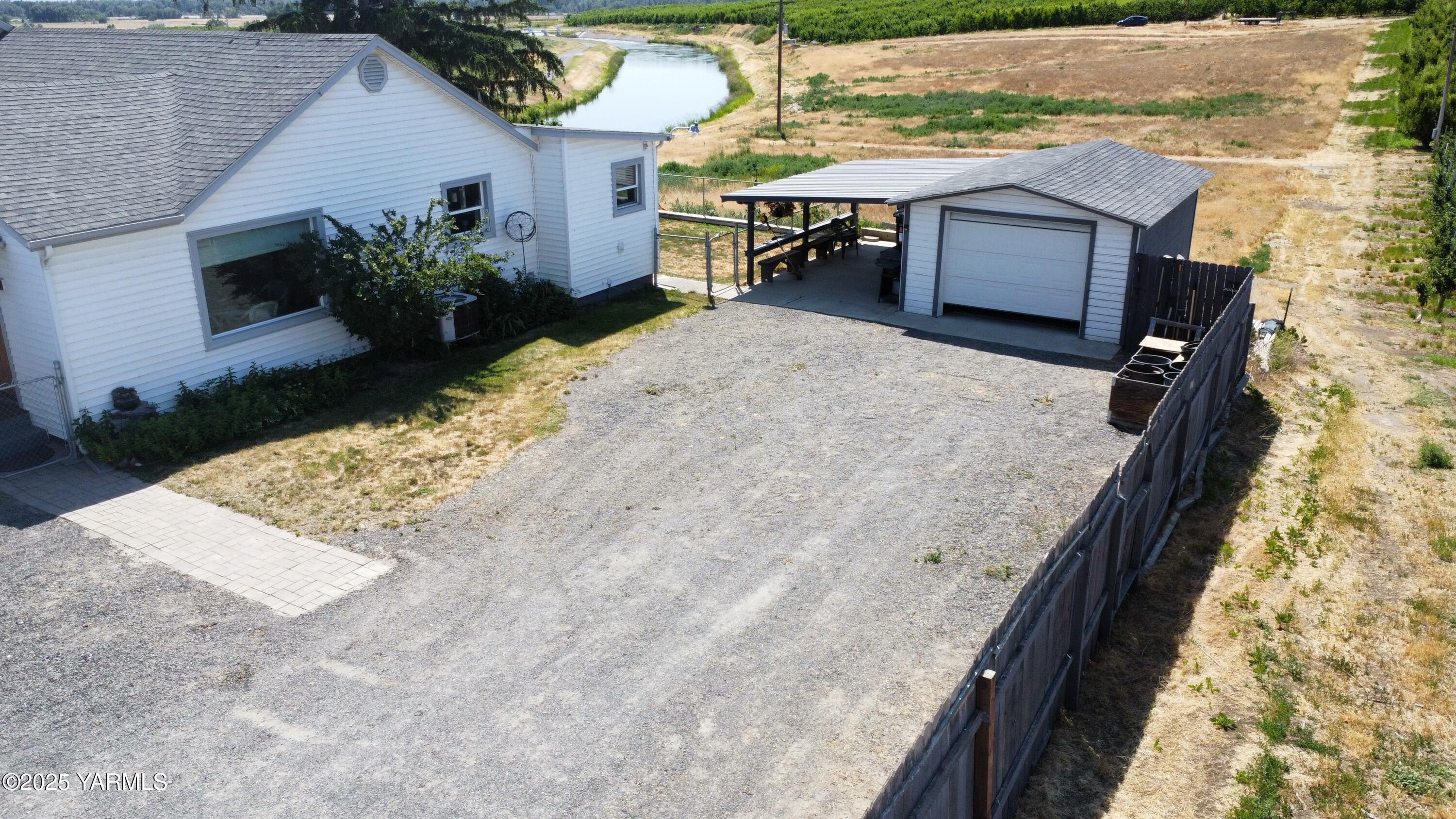960 Knight Hill Road Zillah, WA 98953 - Photo 10 of 21 swimming pool view with a outdoor seating