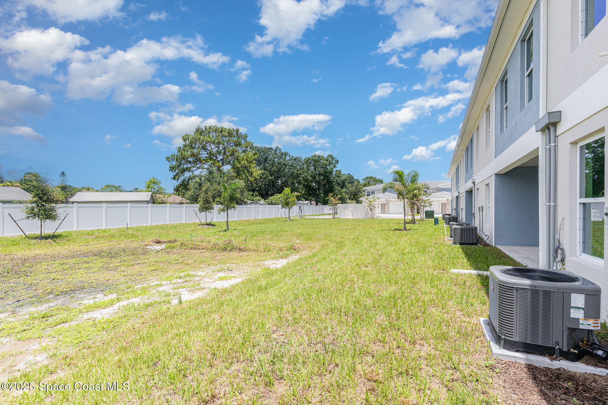 1605 Par Street Northeast, Unit 3201 Palm Bay, FL 32905 - Photo 31 of 42 a view of an house with swimming pool and a yard