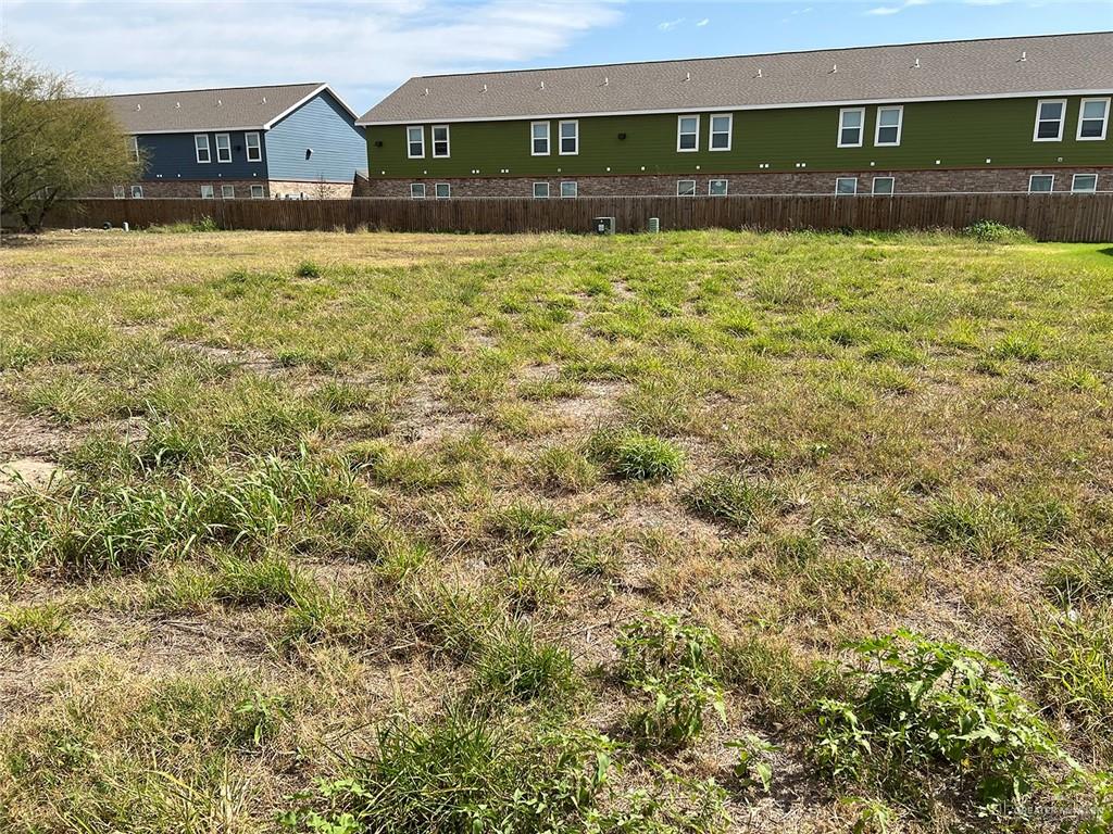 a view of a back yard of the building