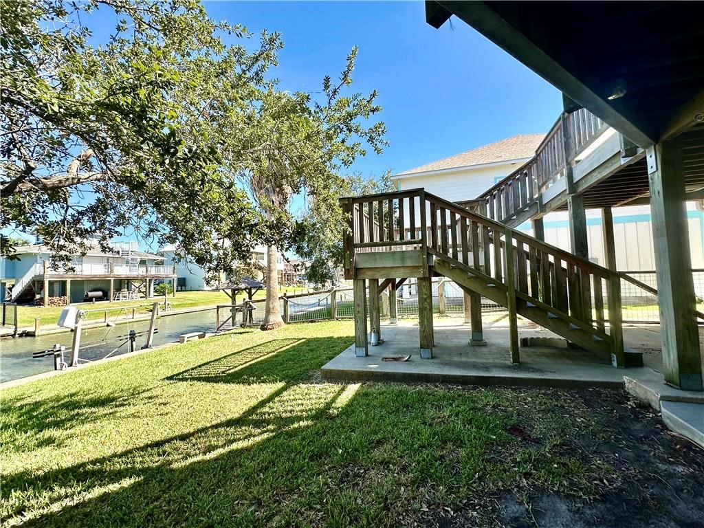 39 Front Street Rockport, TX 78382 - Photo 29 of 38 a view of a house with a yard