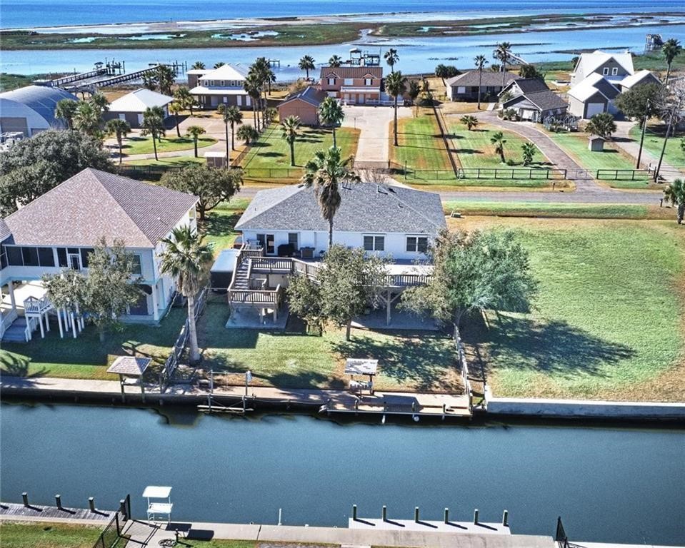 39 Front Street Rockport, TX 78382 - Photo 34 of 38 an aerial view of residential houses with outdoor space and swimming pool