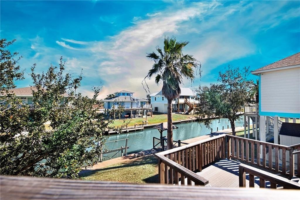 39 Front Street Rockport, TX 78382 - Photo 37 of 38 a view of swimming pool with outdoor seating and plants
