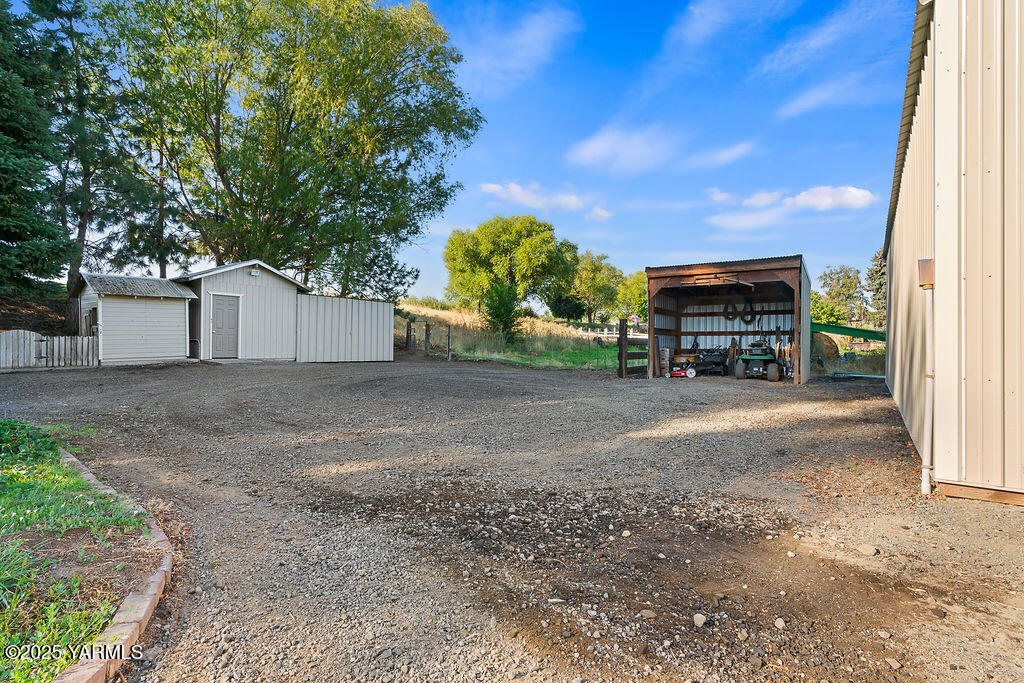 790 Cook Road Yakima, WA 98908 - Photo 39 of 46 a view of a house with a yard