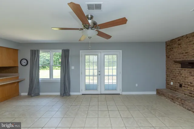 a view of an empty room and window