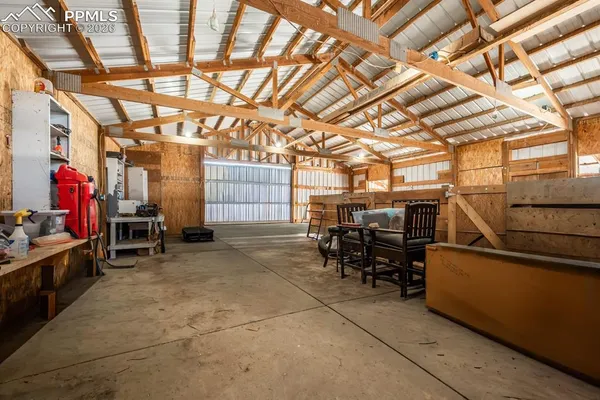 a view of a garage with furniture