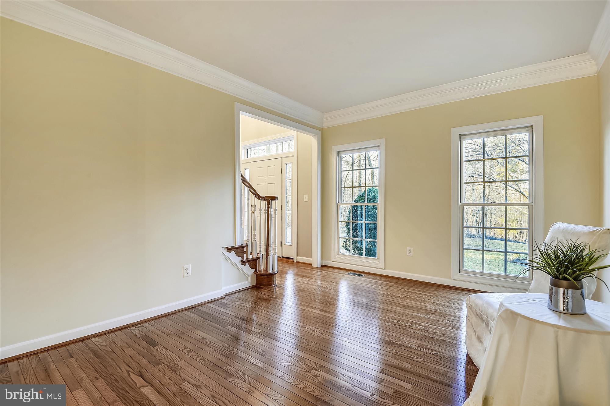 2019 Gresham Lane Davidsonville, MD 21035 - Photo 16 of 85 an empty room with wooden floor and windows