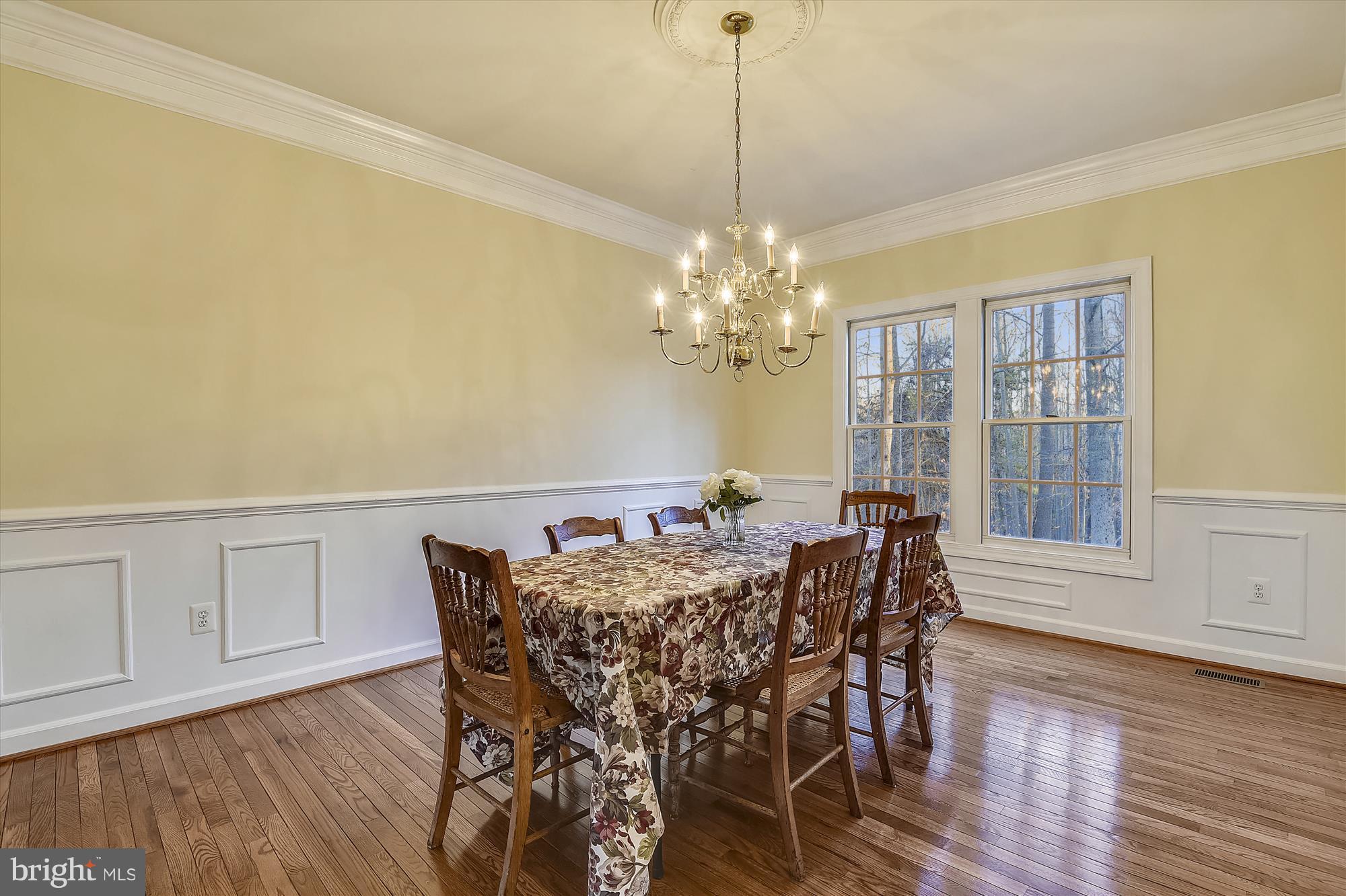 2019 Gresham Lane Davidsonville, MD 21035 - Photo 17 of 85 a view of a dining room with furniture and wooden floor