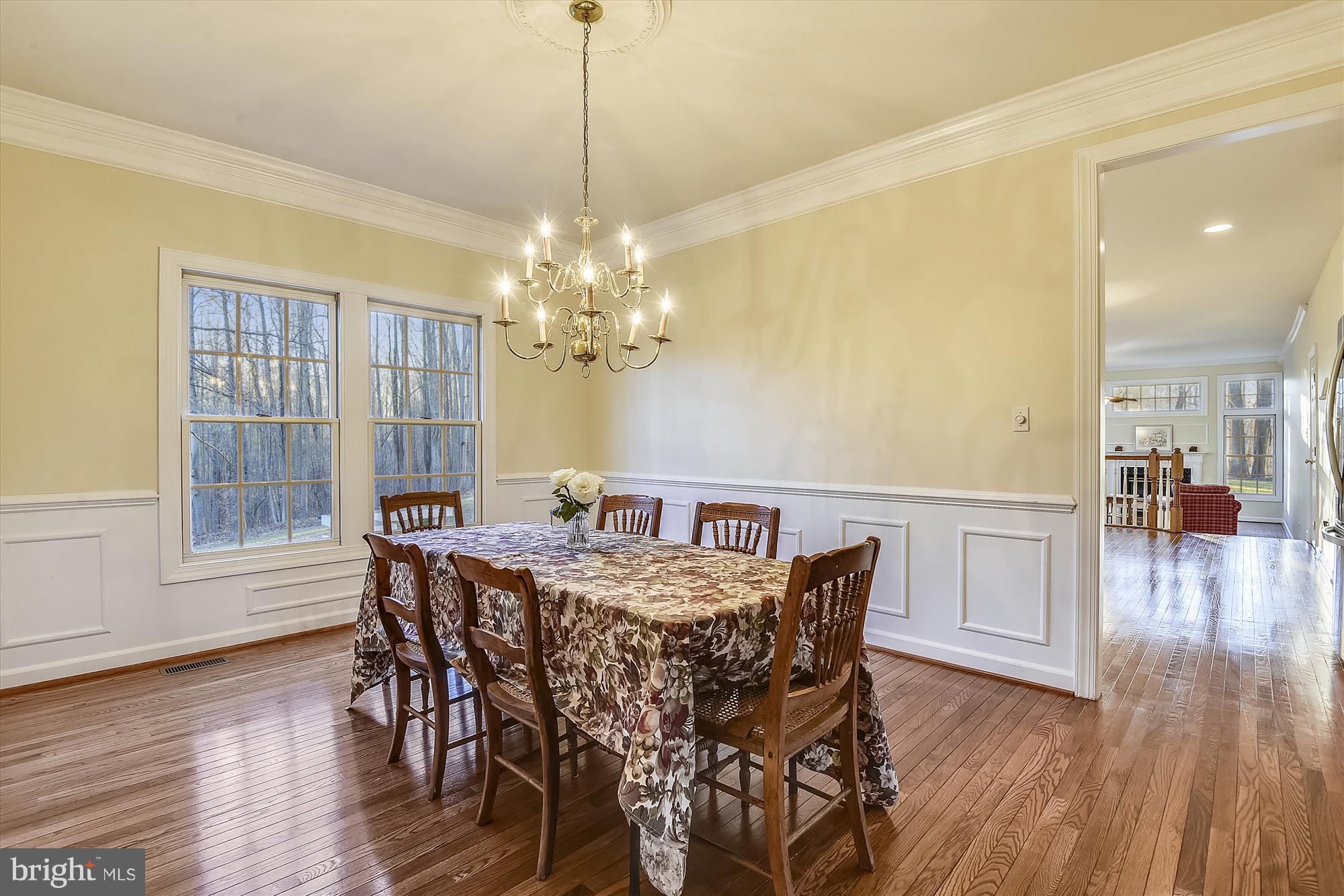 2019 Gresham Lane Davidsonville, MD 21035 - Photo 18 of 85 a view of a dining room with furniture wooden floor and chandelier