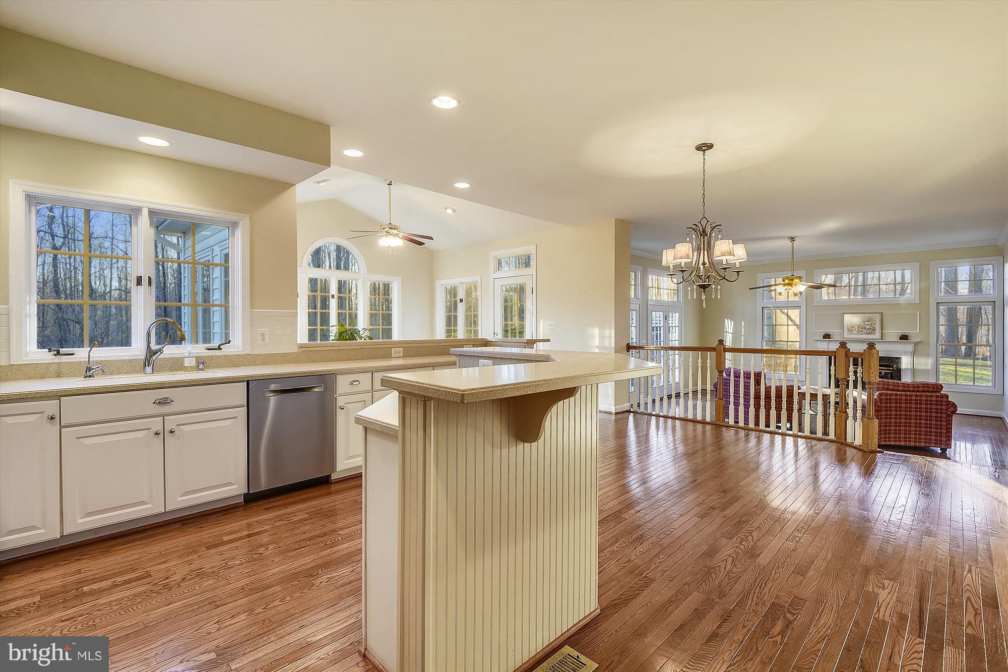 2019 Gresham Lane Davidsonville, MD 21035 - Photo 19 of 85 a kitchen with stainless steel appliances kitchen island hardwood floor and a large window