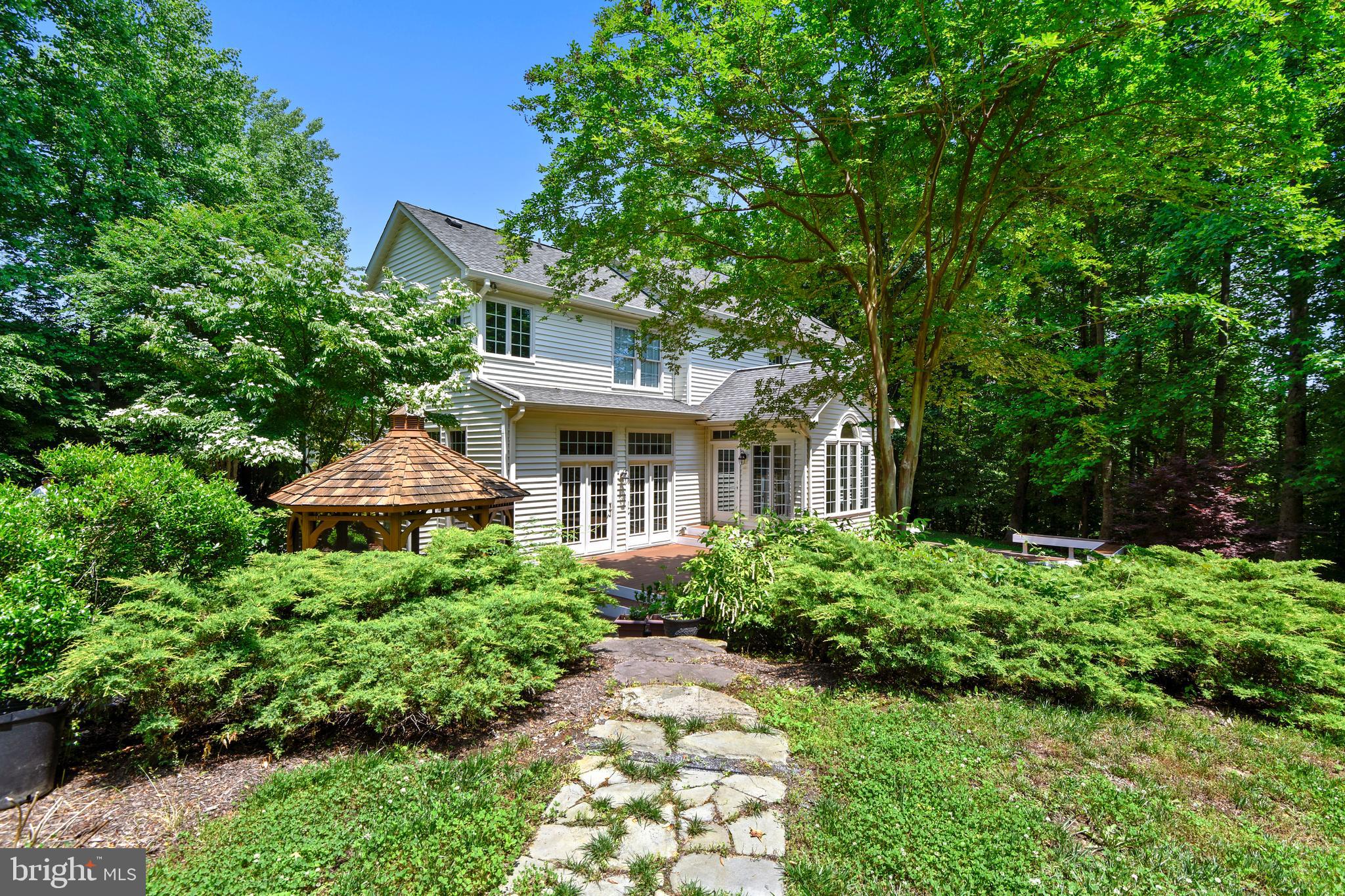 2019 Gresham Lane Davidsonville, MD 21035 - Photo 3 of 85 a front view of a house with a yard