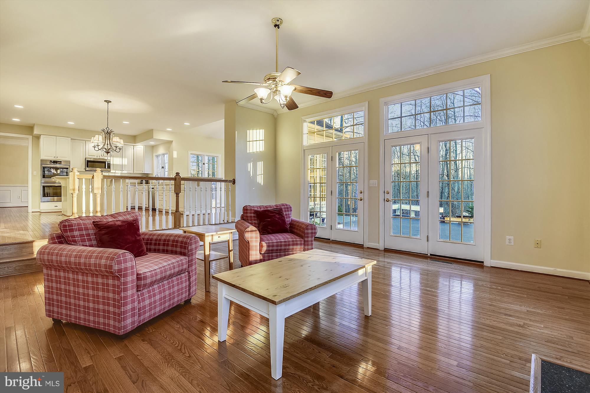 2019 Gresham Lane Davidsonville, MD 21035 - Photo 28 of 85 a living room with furniture and a chandelier