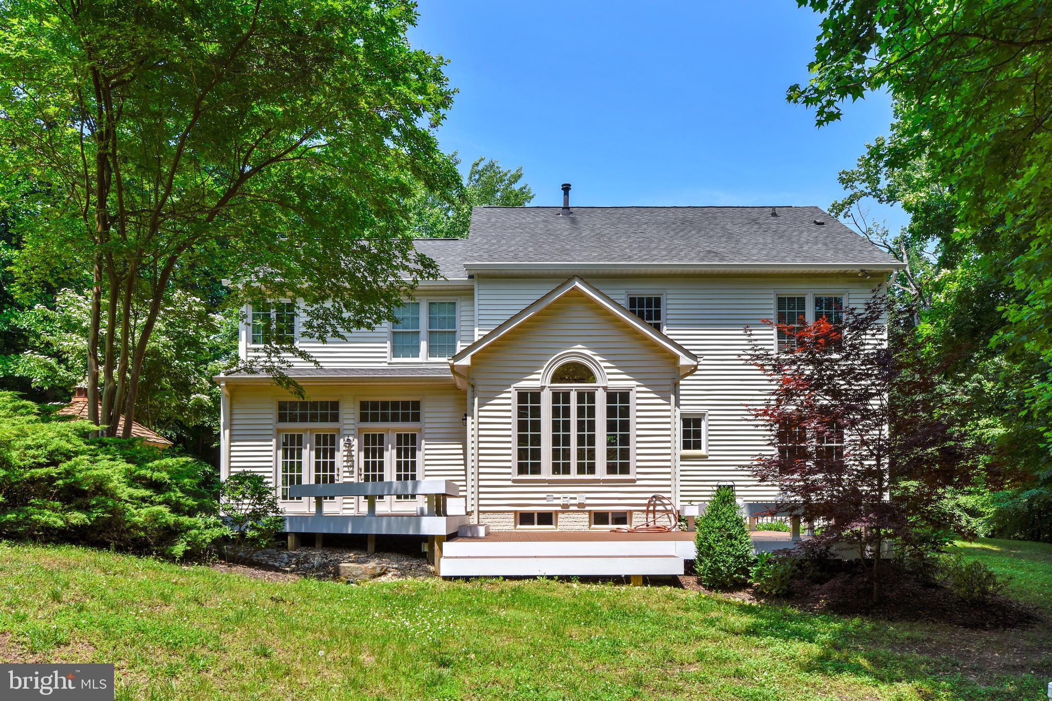 2019 Gresham Lane Davidsonville, MD 21035 - Photo 4 of 85 a front view of a house with a yard table and chairs