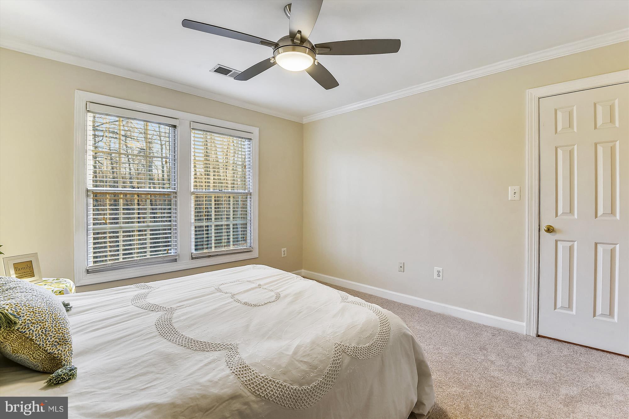 2019 Gresham Lane Davidsonville, MD 21035 - Photo 50 of 85 a bedroom with a large bed and a window