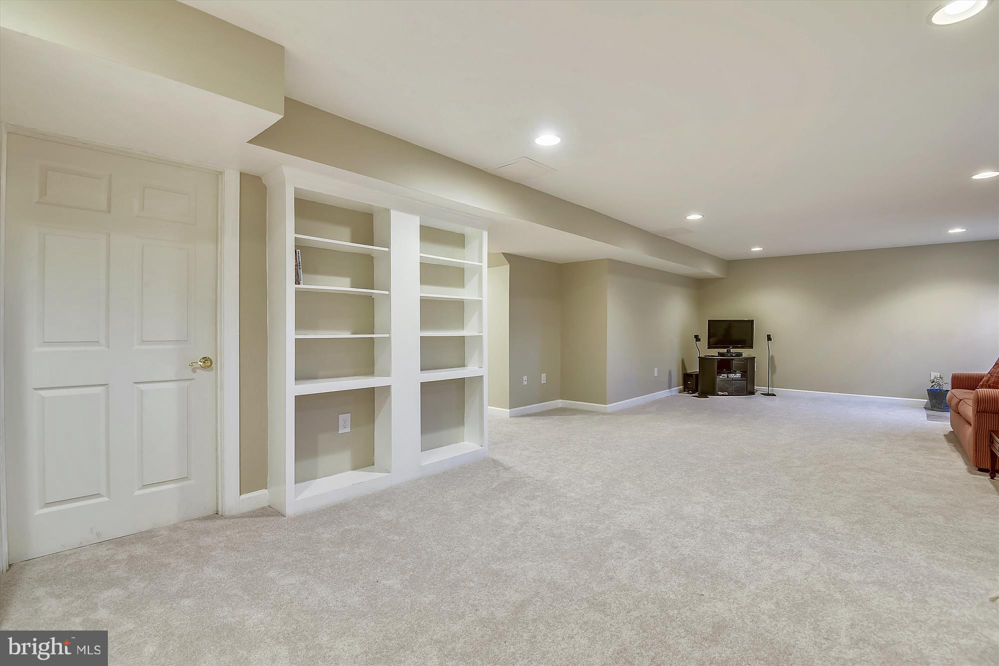 2019 Gresham Lane Davidsonville, MD 21035 - Photo 61 of 85 a view of empty room with a fireplace and cabinet