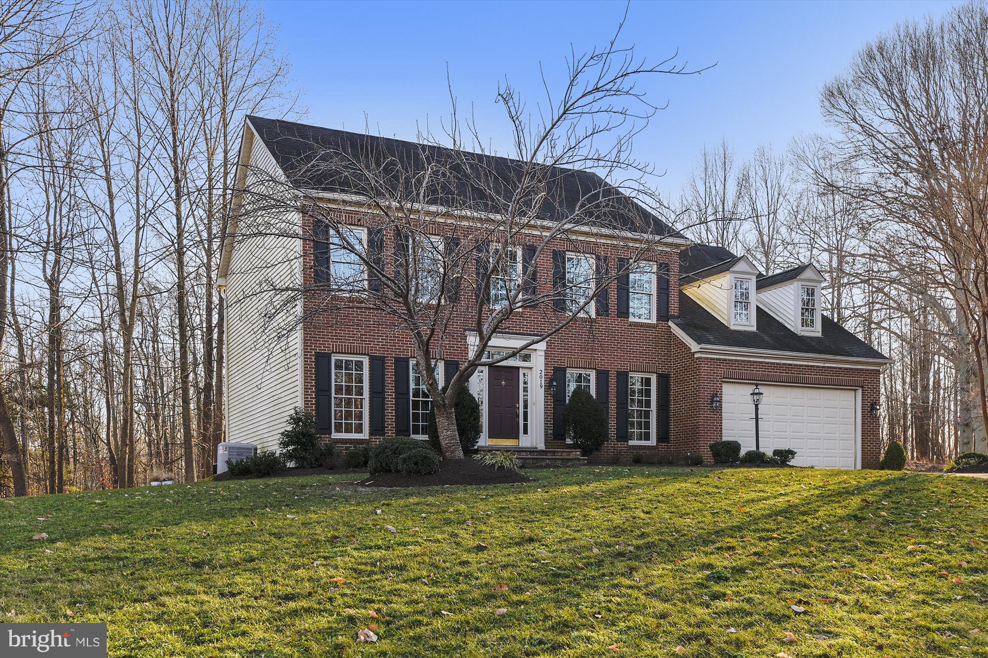 2019 Gresham Lane Davidsonville, MD 21035 - Photo 68 of 85 a front view of a house with a garden