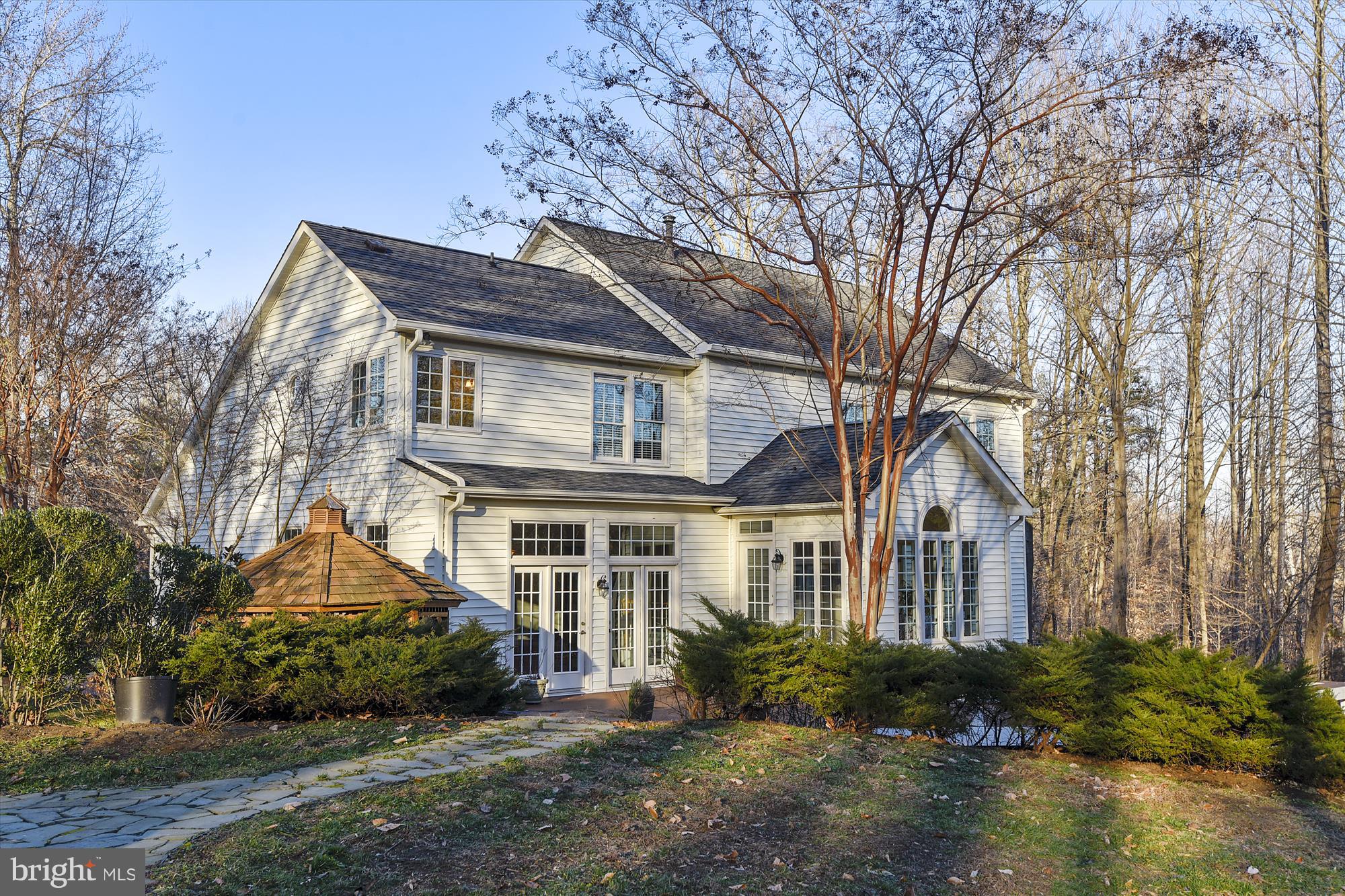 2019 Gresham Lane Davidsonville, MD 21035 - Photo 8 of 85 a front view of house with yard and trees around