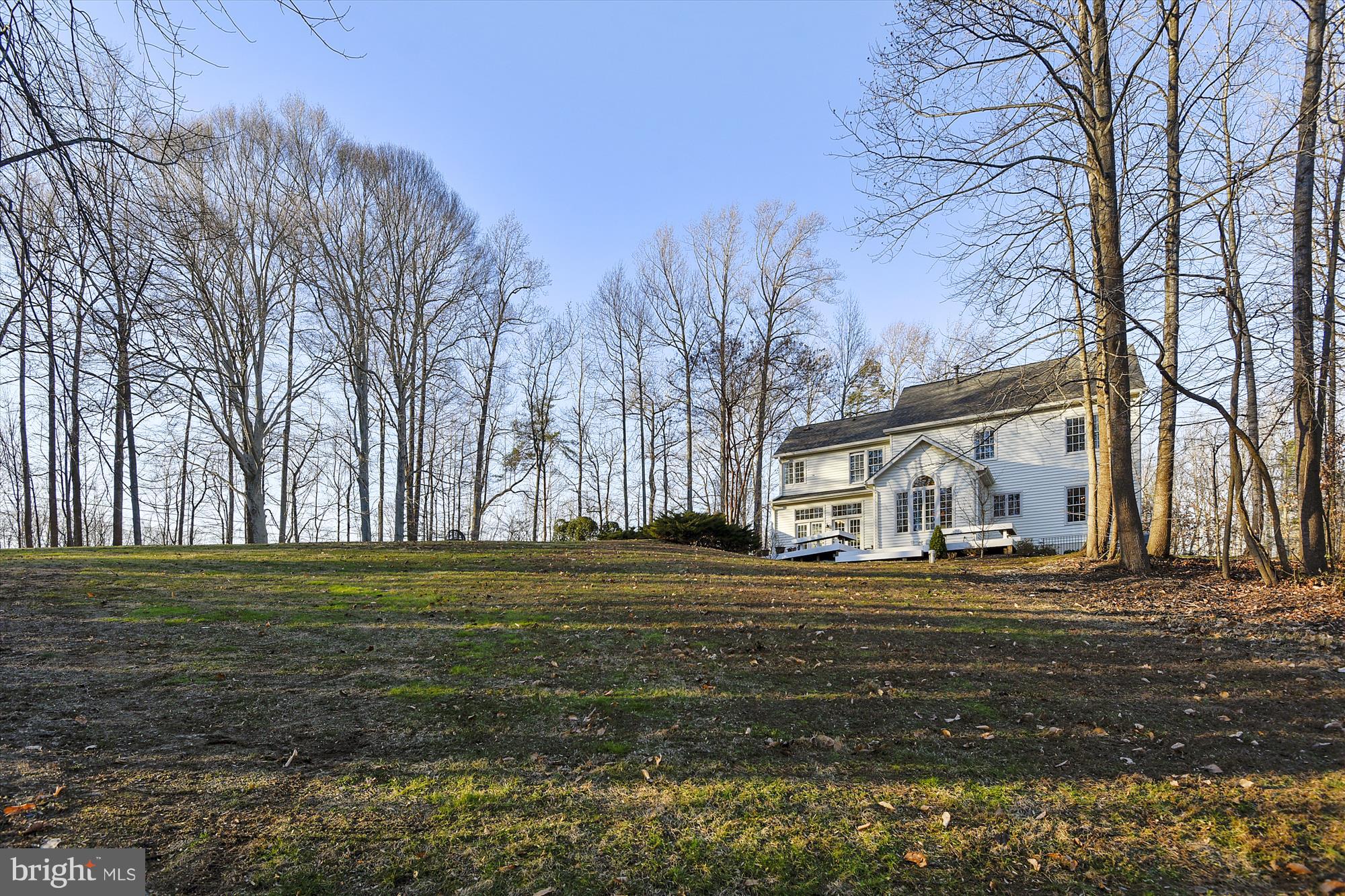2019 Gresham Lane Davidsonville, MD 21035 - Photo 75 of 85 a big house with a big yard and large trees