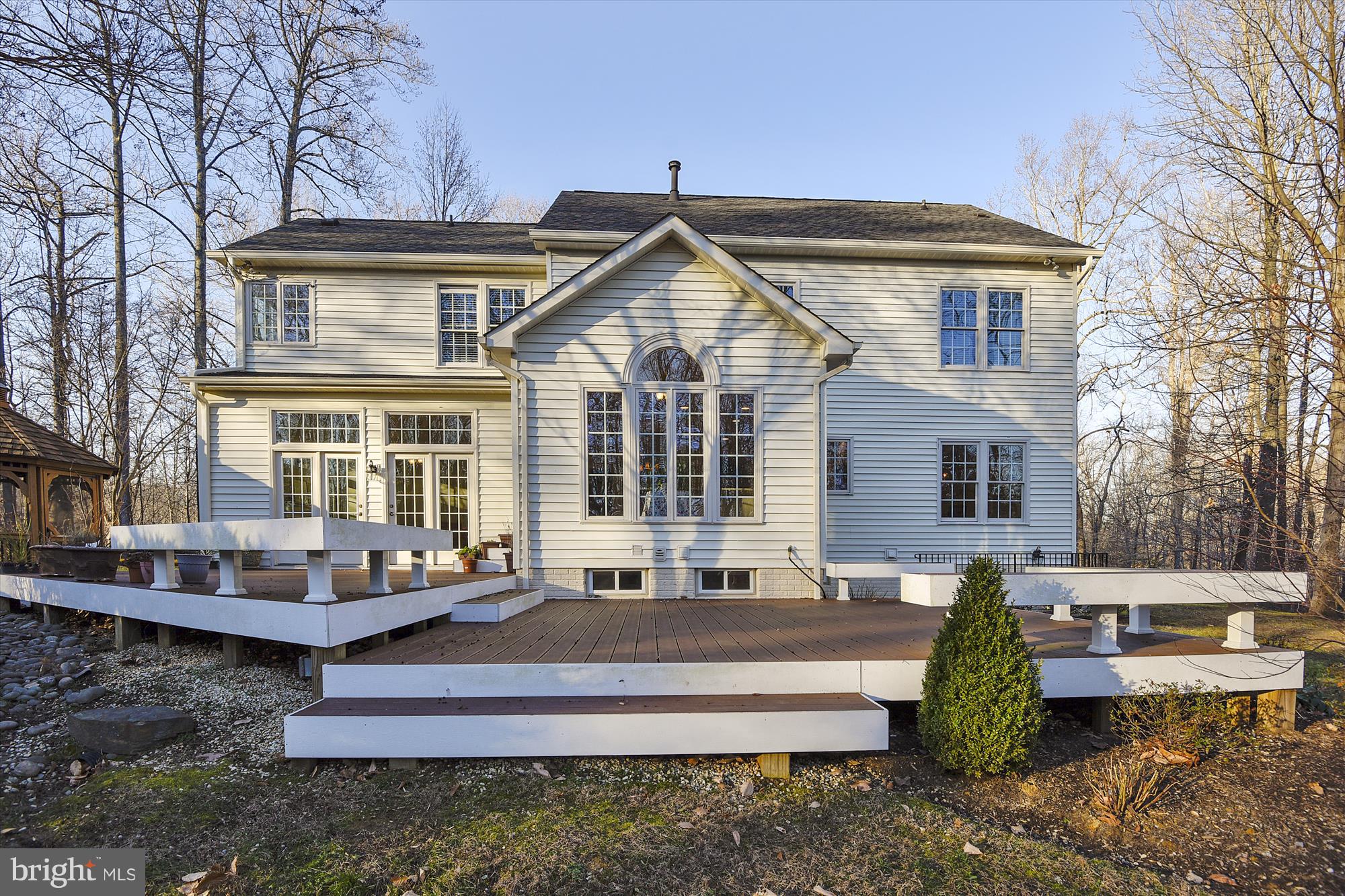 2019 Gresham Lane Davidsonville, MD 21035 - Photo 79 of 85 a front view of a house with patio chairs and a table