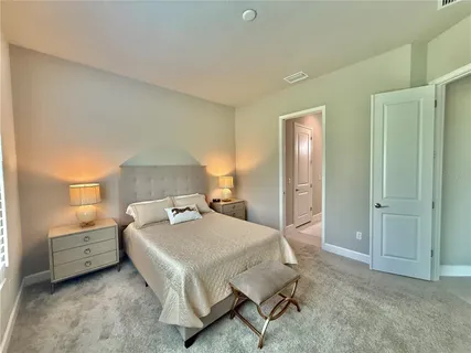 a bathroom with a sink vanity and mirror