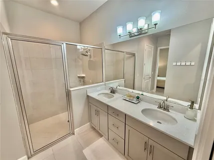 a view of a bedroom from a hallway