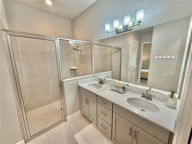 a view of a bedroom from a hallway