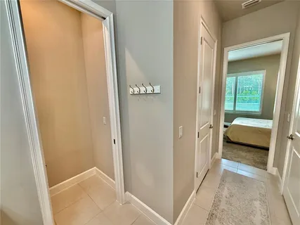 a view of a bathroom from a hallway