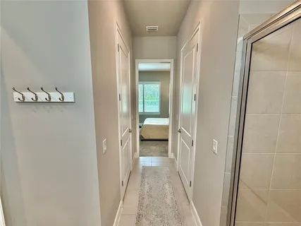 a bedroom with a bed and a cabinets